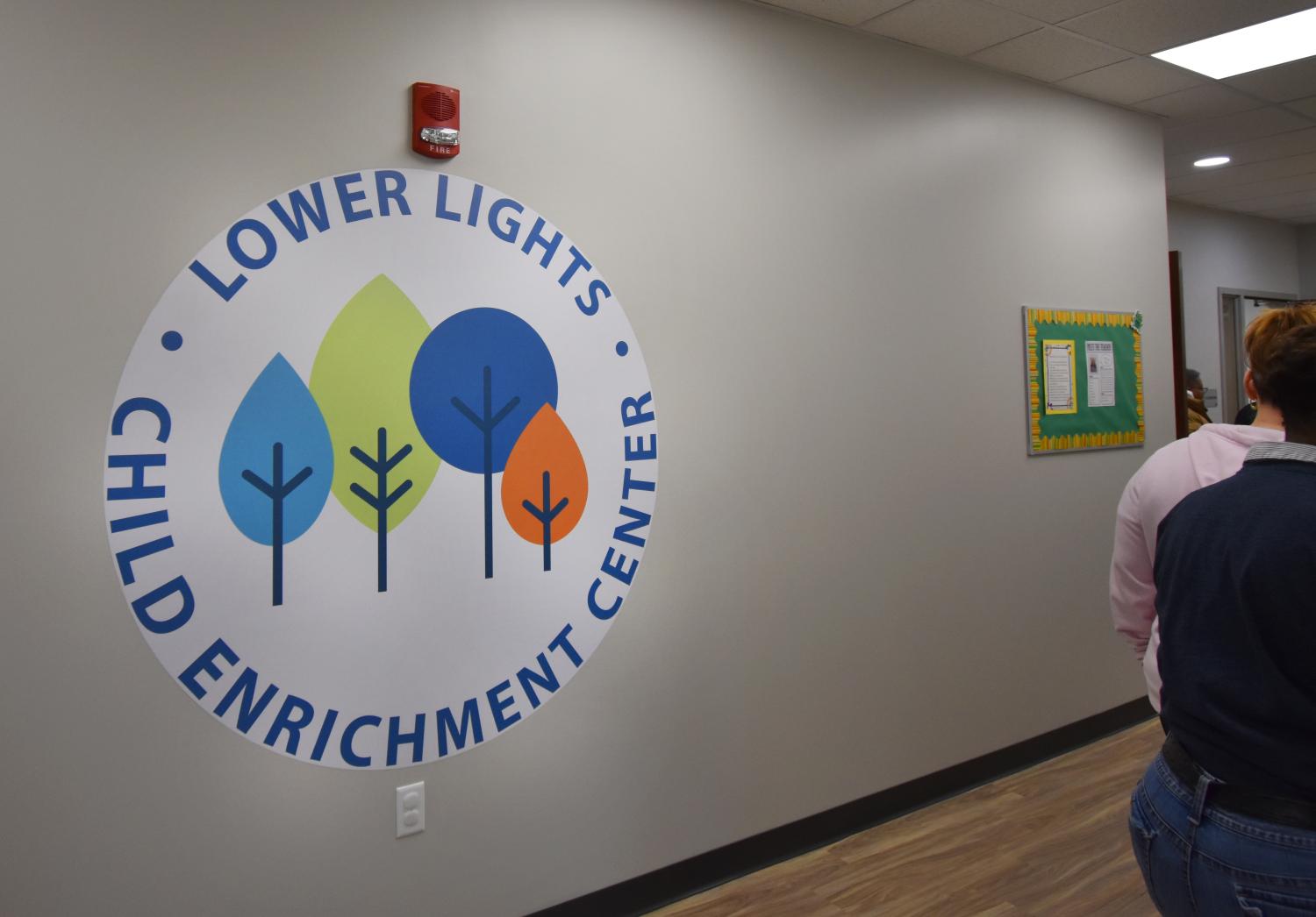 Lower Lights wall sticker in new facility. 